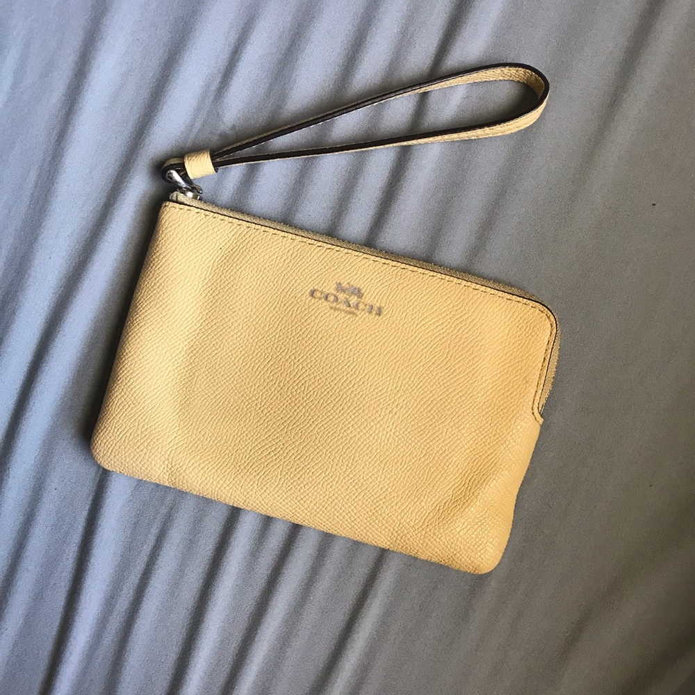 yellow leather coach wristlet